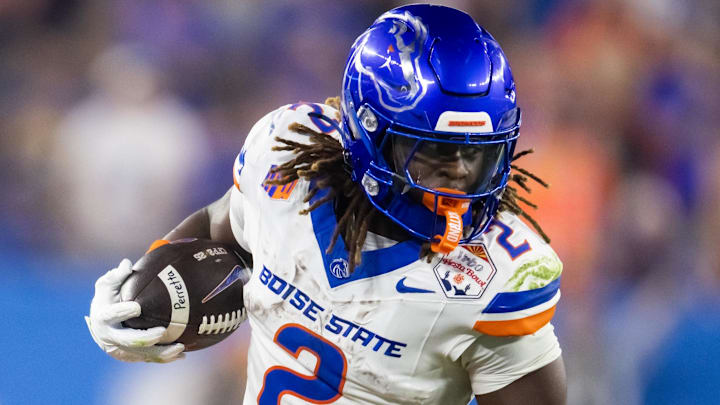 Dec 31, 2024; Glendale, AZ, USA; Boise State Broncos running back Ashton Jeanty (2) against the Penn State Nittany Lions during the Fiesta Bowl at State Farm Stadium. Mandatory Credit: Mark J. Rebilas-Imagn Images