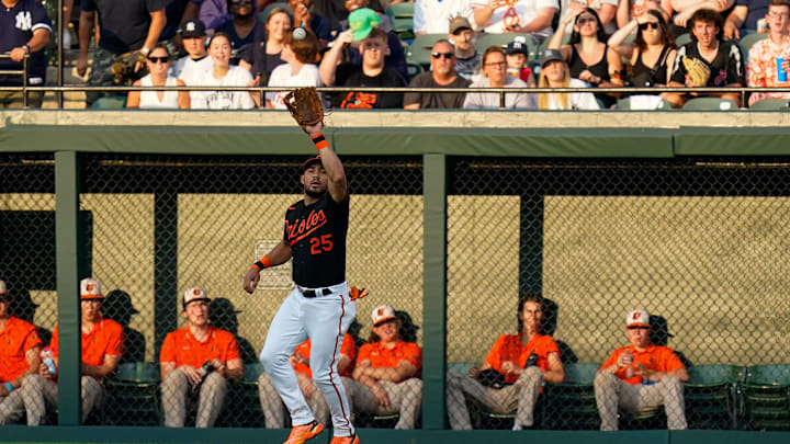 Jul 22, 2022; Baltimore, Maryland, USA; Baltimore Orioles right fielder Anthony Santander (25) catches New York Yankees center fielder Aaron Judge (not pictured) fly ball during the first inning  at Oriole Park at Camden Yards. Mandatory Credit: Tommy Gilligan-Imagn Images