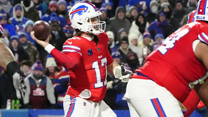 Buffalo Bills QB Josh Allen throws the ball against the New England Patriots during the second half at Highmark Stadium. Buffalo Bills QB Josh Allen throws the ball against the New England Patriots during the second half at Highmark Stadium.