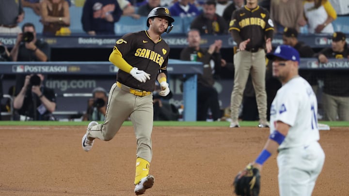 Oct 6, 2024; Los Angeles, California, USA; San Diego Padres catcher Kyle Higashioka (20) runs after hitting a solo home run against the Los Angeles Dodgers in the ninth inning during game two of the NLDS for the 2024 MLB Playoffs at Dodger Stadium.
