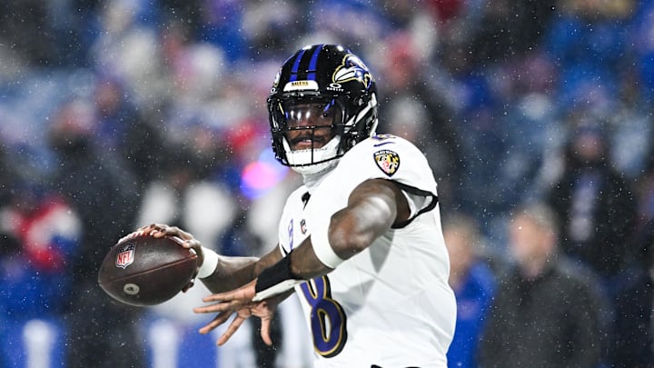 Jan 19, 2025; Orchard Park, New York, USA; Baltimore Ravens quarterback Lamar Jackson (8) throws the ball during warm ups before the game against the Buffalo Bills in a 2025 AFC divisional round game at Highmark Stadium. Mandatory Credit: Mark Konezny-Imagn Images Jan 19, 2025; Orchard Park, New York, USA; Baltimore Ravens quarterback Lamar Jackson (8) throws the ball during warm ups before the game against the Buffalo Bills in a 2025 AFC divisional round game at Highmark Stadium. Mandatory Credit: Mark Konezny-Imagn Images