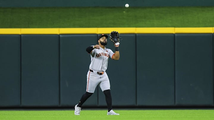 Cincinnati, Ohio, USA; San Francisco Giants outfielder Heliot Ramos (17) catches a fly out hit by Cincinnati Reds shortstop Elly De La Cruz (not pictured) in the sixth inning at Great American Ball Park.