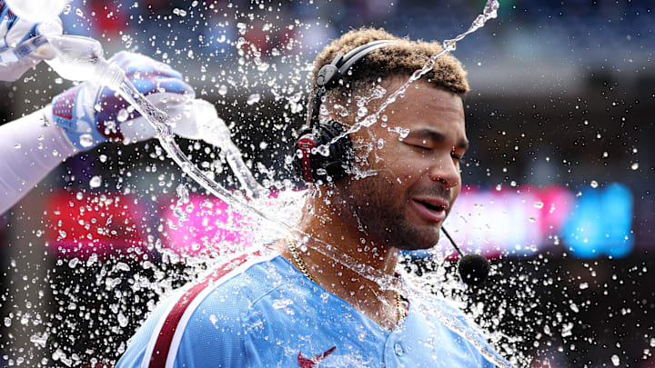Apr 30, 2026; Philadelphia, Pennsylvania, USA; Philadelphia Phillies center fielder Justin Crawford (2) is doused by water after hitting a walk off RBI single during the ninth inning against the San Francisco Giants at Citizens Bank Park. 