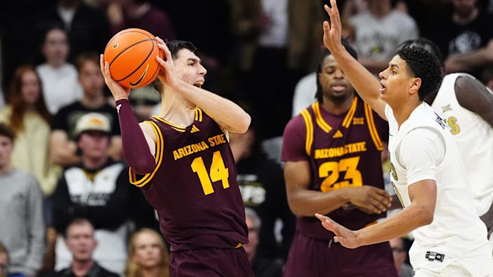 Feb 7, 2026; Boulder, Colorado, USA; Colorado Buffaloes guard Jalin Holland (11) defends on Arizona State Sun Devils forward Andrija Grbovic (14) in the second half at the CU Events Center. Mandatory Credit: Ron Chenoy-Imagn Images Feb 7, 2026; Boulder, Colorado, USA; Colorado Buffaloes guard Jalin Holland (11) defends on Arizona State Sun Devils forward Andrija Grbovic (14) in the second half at the CU Events Center. Mandatory Credit: Ron Chenoy-Imagn Images
