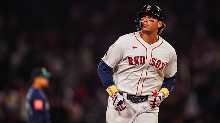 Apr 22, 2025; Boston, Massachusetts, USA; Boston Red Sox first base Triston Casas (36) hits a three run home run against the Seattle Mariners in the seventh inning at Fenway Park. Mandatory Credit: David Butler II-Imagn Images