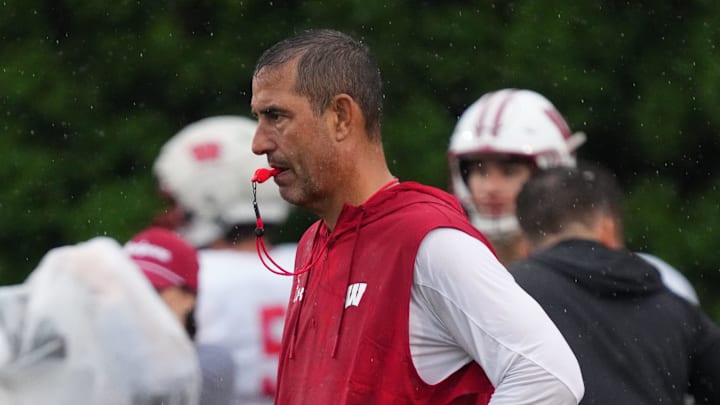 Wisconsin football head coach Luke Fickell observes practice, July 30, 2025, at Ralph E. Davis Pioneer Stadium in Platteville, Wisconsin.