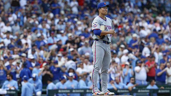 Apr 17, 2026; Chicago, Illinois, USA; New York Mets starting pitcher Kodai Senga (34) reacts after giving up a two-run home run to Chicago Cubs second baseman Nico Hoerner during the second inning at Wrigley Field. Mandatory Credit: Kamil Krzaczynski-Imagn Images