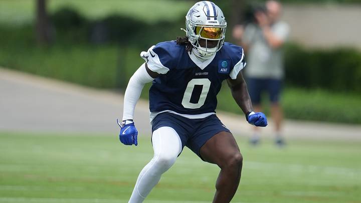 Dallas Cowboys linebacker DeMarvion Overshown goes through a drill during practice at the Ford Center. Dallas Cowboys linebacker DeMarvion Overshown goes through a drill during practice at the Ford Center.