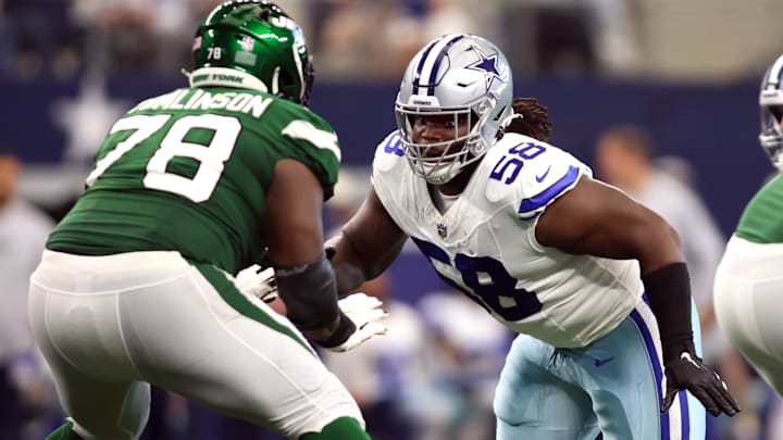 Dallas Cowboys defensive tackle Mazi Smith rushes the passer while blocked by New York Jets guard Laken Tomlinson. Dallas Cowboys defensive tackle Mazi Smith rushes the passer while blocked by New York Jets guard Laken Tomlinson.