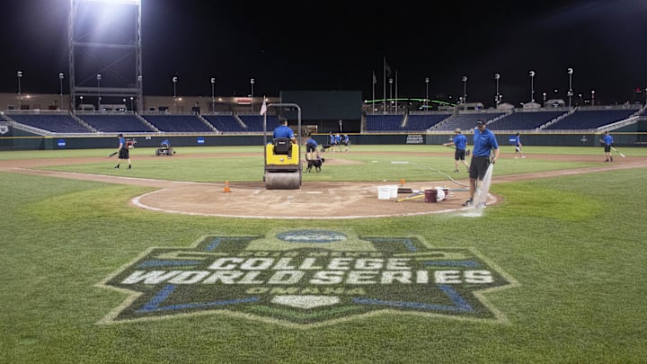 Jun 18, 2018; Omaha, NE, USA; The CWS Grounds Crew works the field after the game between the Washington Huskies and the Oregon State Beavers in the College World Series at TD Ameritrade Park. Mandatory Credit: Steven Branscombe-Imagn Images