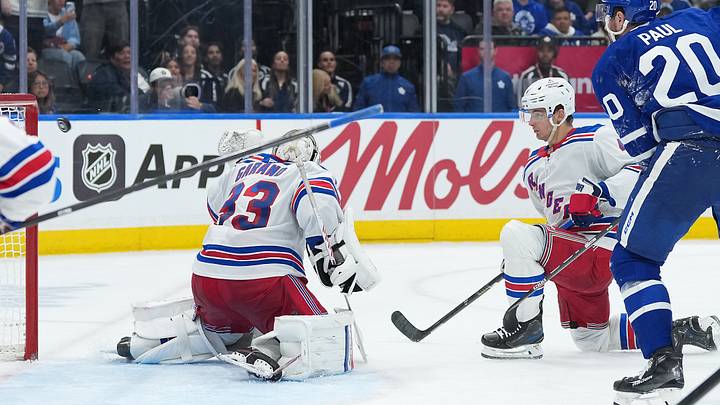 Oct 22, 2026; Toronto, Ontario, CAN;  New York Rangers goaltender Dylan Garand (33) is unable to stop the puck as Toronto Maple Leafs defenseman Troy Stecher (28) (not pictured) scores the goal during the third period at Scotiabank Arena.  Mandatory Credit: Nick Turchiaro-Imagn Images