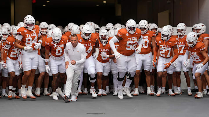 Sep 20, 2025; Austin, Texas, USA; Texas Longhorns head coach Steve Sarkisian leads his team on to the field before a game against the Sam Houston State Bearkats at Darrell K Royal-Texas Memorial Stadium. Mandatory Credit: Scott Wachter-Imagn Images Sep 20, 2025; Austin, Texas, USA; Texas Longhorns head coach Steve Sarkisian leads his team on to the field before a game against the Sam Houston State Bearkats at Darrell K Royal-Texas Memorial Stadium. Mandatory Credit: Scott Wachter-Imagn Images