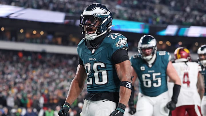 Jan 26, 2025; Philadelphia, PA, USA; Philadelphia Eagles running back Saquon Barkley (26) celebrates after a touchdown against the Washington Commanders during the second half in the NFC Championship game at Lincoln Financial Field. Mandatory Credit: Bill Streicher-Imagn Images