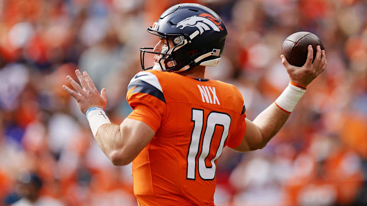 Oct 19, 2025; Denver, Colorado, USA; Denver Broncos quarterback Bo Nix (10) makes a pass during the first half against the New York Giants at Empower Field at Mile High. 