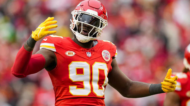 Dec 25, 2023; Kansas City, Missouri, USA; Kansas City Chiefs defensive end Charles Omenihu (90) rallies the crowd during the second half against the Las Vegas Raiders at GEHA Field at Arrowhead Stadium. Mandatory Credit: Jay Biggerstaff-USA TODAY Sports