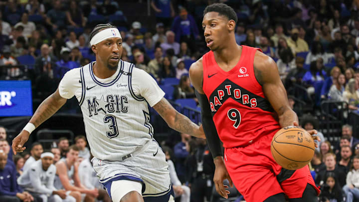 Toronto Raptors guard RJ Barrett (9) drives around Orlando Magic guard Kentavious Caldwell-Pope (3) during the second half at Kia Center.