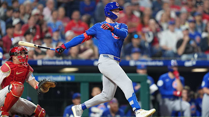 Jun 9, 2025; Philadelphia, Pennsylvania, USA; Chicago Cubs outfielder Pete Crow-Armstrong (4) hits an RBI double against the Philadelphia Phillies in the eleventh inning at Citizens Bank Park.