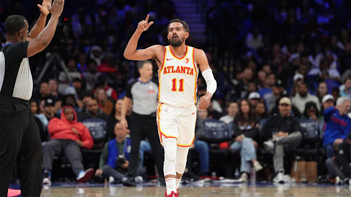 Apr 11, 2025; Philadelphia, Pennsylvania, USA; Atlanta Hawks guard Trae Young (11) reacts after scoring against the Philadelphia 76ers in the fourth quarter at Wells Fargo Center. Mandatory Credit: Kyle Ross-Imagn Images
