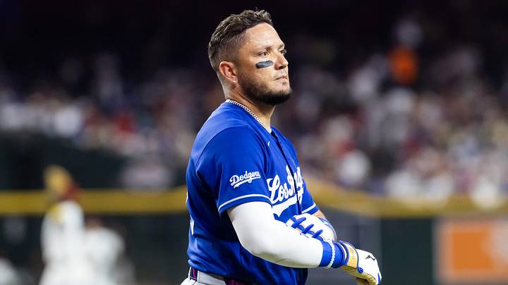 Jun 1, 2026; Phoenix, Arizona, USA; Los Angeles Dodgers batter Miguel Rojas reacts after being called out on strikes via ABS challenge in the fourth inning against the Arizona Diamondbacks at Chase Field. Mandatory Credit: Mark J. Rebilas-Imagn Images