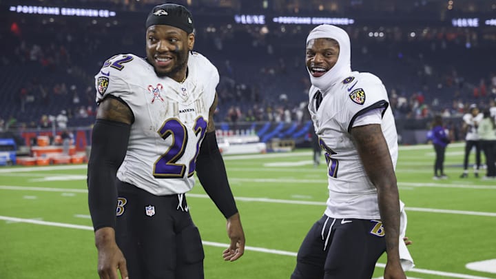 Dec 25, 2024; Houston, Texas, USA;  Baltimore Ravens running back Derrick Henry (22) and quarterback Lamar Jackson (8) smile after the game against the Houston Texans at NRG Stadium. Mandatory Credit: Troy Taormina-Imagn Images
