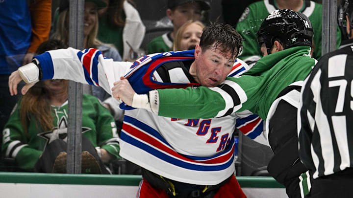 Apr 11, 2026; Dallas, Texas, USA; New York Rangers left wing J.T. Miller (8) fights with Dallas Stars left wing Jamie Benn (14) during the second period at the American Airlines Center. Mandatory Credit: Jerome Miron-Imagn Images Apr 11, 2026; Dallas, Texas, USA; New York Rangers left wing J.T. Miller (8) fights with Dallas Stars left wing Jamie Benn (14) during the second period at the American Airlines Center. Mandatory Credit: Jerome Miron-Imagn Images