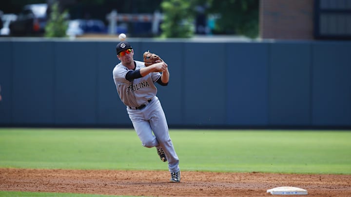 June 11, 2013; Chapel Hill, NC, USA; South Carolina shortstop Joey Pankake (9) makes a throw to 1st base during the game against North Carolina Tar Heels during the Chapel Hill Super Regional of the NCAA baseball tournament at Boshamer Stadium. The Tar Heels defeated the Gamecocks 5-4. Mandatory Credit: James Guillory-Imagn Images