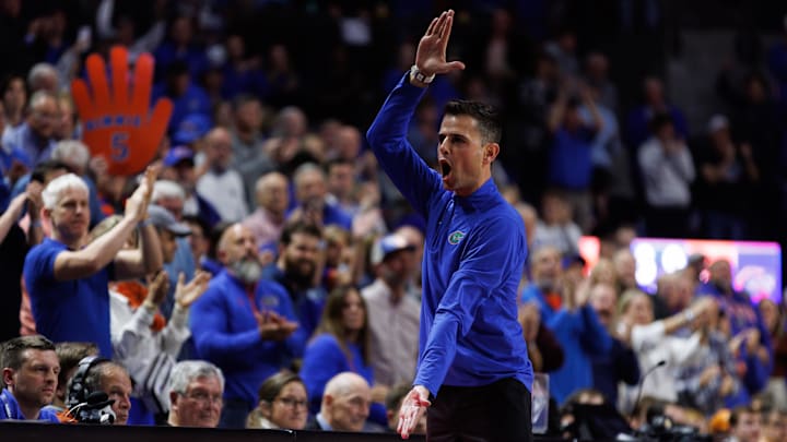 Jan 7, 2025; Gainesville, Florida, USA; Florida Gators head coach Todd Golden gestures toward the crowd against the Tennessee Volunteers during the second half at Exactech Arena at the Stephen C. O'Connell Center. Mandatory Credit: Matt Pendleton-Imagn Images