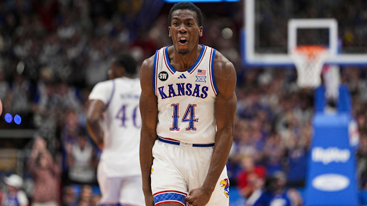 Jan 13, 2026; Lawrence, Kansas, USA; Kansas Jayhawks guard Melvin Council Jr. (14) celebrates after scoring during the second half against the Iowa State Cyclones at Allen Fieldhouse. Mandatory Credit: Jay Biggerstaff-Imagn Images
