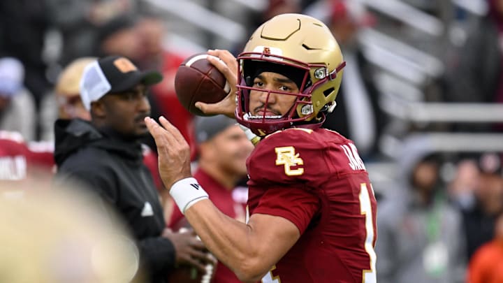 Nov 23, 2024; Chestnut Hill, Massachusetts, USA;  Boston College Eagles quarterback Grayson James (14) warms up before a game against the North Carolina Tar Heels at Alumni Stadium. Mandatory Credit: Eric Canha-Imagn Images
