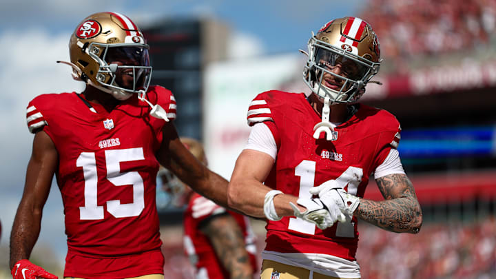 Nov 10, 2024; Tampa, Florida, USA; San Francisco 49ers wide receiver Ricky Pearsall (14) celebrates with wide receiver Jauan Jennings (15) after scoring a touchdown against the Tampa Bay Buccaneers in the first quarter at Raymond James Stadium. Mandatory Credit: Nathan Ray Seebeck-Imagn Images