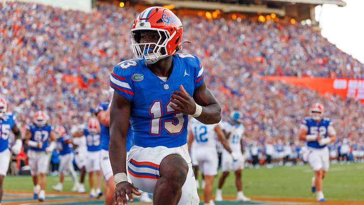 Sep 26, 2026; Gainesville, Florida, USA;  Florida Gators running back Jadan Baugh (13) celebrates with a Heisman pose against the Mississippi Rebels during the second half at Ben Hill Griffin Stadium.  Mandatory Credit: Matt Pendleton-Imagn Images