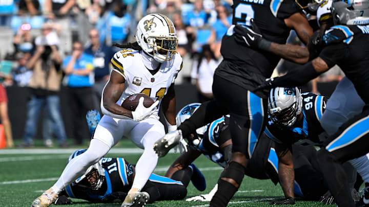 Nov 9, 2025; Charlotte, North Carolina, USA;  New Orleans Saints running back Alvin Kamara (41) runs in the first quarter at Bank of America Stadium. Mandatory Credit: Bob Donnan-Imagn Images