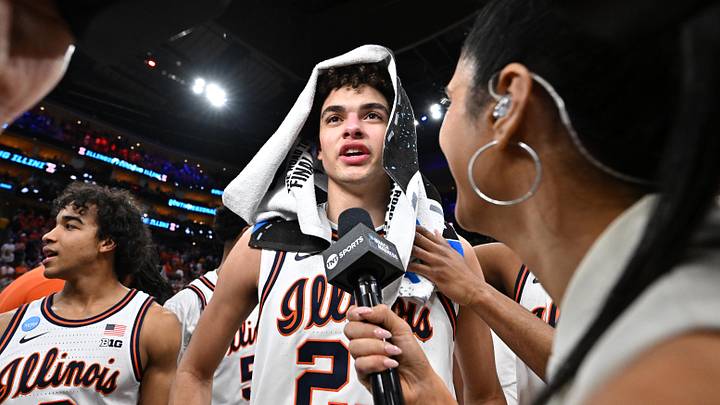 Mar 28, 2026; Houston, TX, USA; Illinois Fighting Illini guard Keaton Wagler (23) speaks to media after defeating the Iowa Hawkeyes in an Elite Eight game of the South Regional of the men's 2026 NCAA Tournament at Toyota Center. Mandatory Credit: Maria Lysaker-Imagn Images
