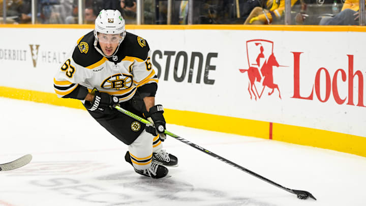 Oct 22, 2024; Nashville, Tennessee, USA;  Boston Bruins left wing Brad Marchand (63) skates with the puck against against the Nashville Predators during the second period at Bridgestone Arena. Mandatory Credit: Steve Roberts-Imagn Images