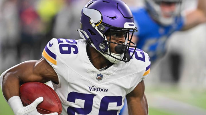 Dec 24, 2023; Minneapolis, Minnesota, USA; Minnesota Vikings running back Kene Nwangwu (26) returns a kickoff against the Detroit Lions during the game at U.S. Bank Stadium. Dec 24, 2023; Minneapolis, Minnesota, USA; Minnesota Vikings running back Kene Nwangwu (26) returns a kickoff against the Detroit Lions during the game at U.S. Bank Stadium.