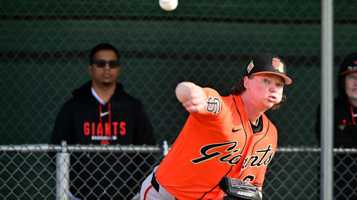 Feb 18, 2026; Scottsdale, AZ, USA; San Francisco Giants pitcher Hayden Birdsong (60) warms up during a Spring Training workout at Scottsdale Stadium Mandatory Credit: Matt Kartozian-Imagn Images