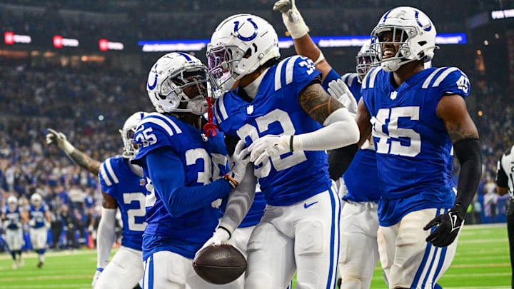 Sep 29, 2024; Indianapolis, Indiana, USA; Indianapolis Colts safety Julian Blackmon (32) celebrates recovering a fumble with the team during the second quarter against the Pittsburgh Steelers at Lucas Oil Stadium. Mandatory Credit: Marc Lebryk-Imagn Images