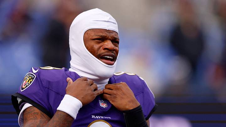 Baltimore Ravens quarterback Lamar Jackson looks on Baltimore Ravens quarterback Lamar Jackson looks on