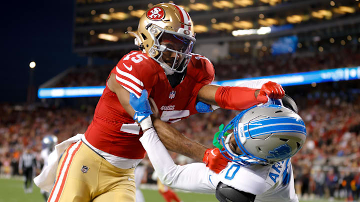 Dec 30, 2024; Santa Clara, California, USA; San Francisco 49ers wide receiver Jauan Jennings (15) and Detroit Lions cornerback Terrion Arnold (0) get tangled after a play during the first quarter at Levi's Stadium. Mandatory Credit: Sergio Estrada-Imagn Images Dec 30, 2024; Santa Clara, California, USA; San Francisco 49ers wide receiver Jauan Jennings (15) and Detroit Lions cornerback Terrion Arnold (0) get tangled after a play during the first quarter at Levi's Stadium. Mandatory Credit: Sergio Estrada-Imagn Images