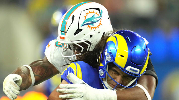 Los Angeles Rams wide receiver Puka Nacua (17) is tackled by Miami Dolphins linebacker Quinton Bell (56) in the second half at SoFi Stadium last season.