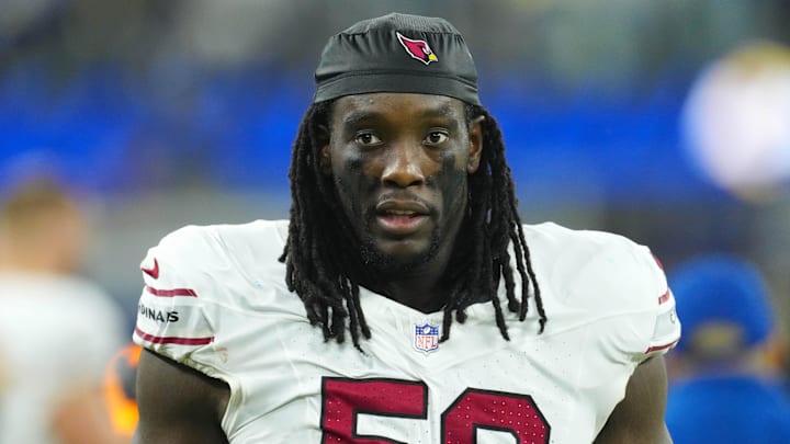 Dec 28, 2024; Inglewood, California, USA; Arizona Cardinals defensive end Darius Robinson (56) reacts against the Los Angeles Rams in the second half at SoFi Stadium. Mandatory Credit: Kirby Lee-Imagn Images