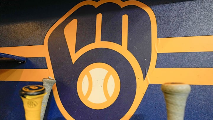 Apr 18, 2025; Milwaukee, Wisconsin, USA; General view of the Milwaukee Brewers logo in the dugout during batting practice prior to the game against the Athletics at American Family Field. Mandatory Credit: Jeff Hanisch-Imagn Images Apr 18, 2025; Milwaukee, Wisconsin, USA; General view of the Milwaukee Brewers logo in the dugout during batting practice prior to the game against the Athletics at American Family Field. Mandatory Credit: Jeff Hanisch-Imagn Images