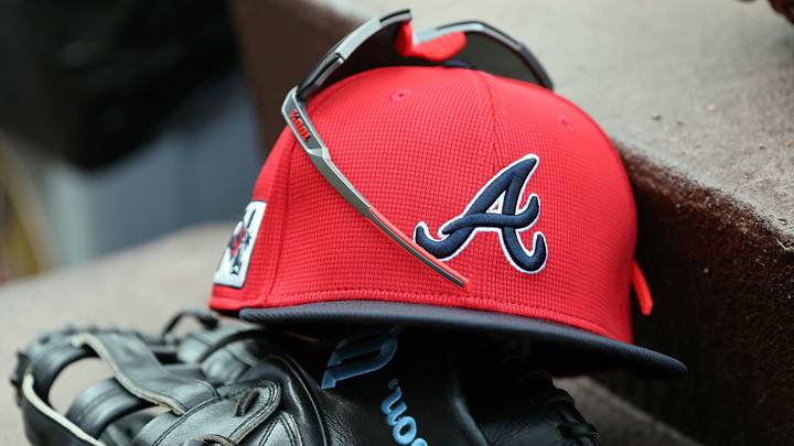 wMar 1, 2025; North Port, Florida, USA; A detail view of Atlanta Braves hat, sunglasses and glove in the dugout during the fifth inning at CoolToday Park. Mandatory Credit: Kim Klement Neitzel-Imagn Images wMar 1, 2025; North Port, Florida, USA; A detail view of Atlanta Braves hat, sunglasses and glove in the dugout during the fifth inning at CoolToday Park. Mandatory Credit: Kim Klement Neitzel-Imagn Images