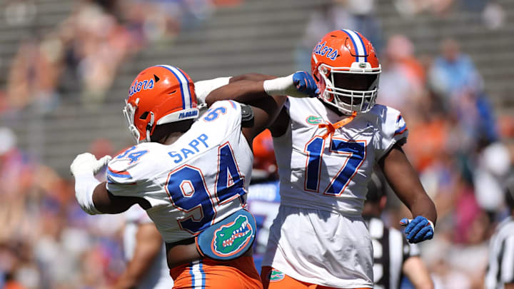 Florida Gators defensive linemen Tyreak Sapp and LJ McCray celebrate a play