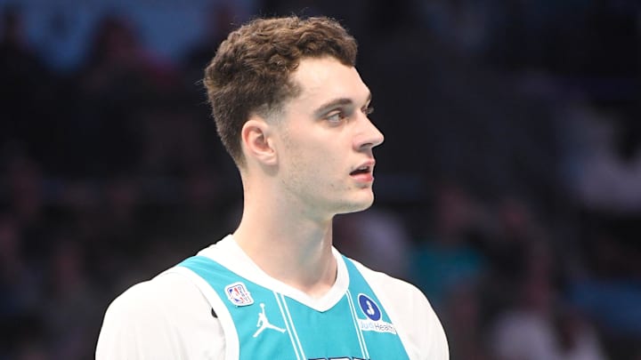 Oct 22, 2025; Charlotte, North Carolina, USA;  Charlotte Hornets center Ryan Kalkbrenner (11) during the first half against the Brooklyn Nets at the Spectrum Center. Mandatory Credit: Sam Sharpe-Imagn Images