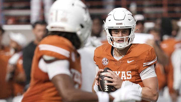 Texas Longhorns quarterback Arch Manning looks to pass on the first play of the game against the Vanderbilt Commodores at Darrell K Royal-Texas Memorial Stadium. 