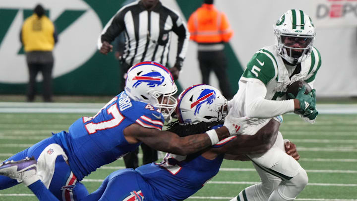 East Rutherford, NJ -- October 14, 2024 -- Garrett Wilson of the Jets is taken down in the first half. The Buffalo Bills came to MetLife Stadium to play the NY Jets. The Jets played their first game under new interim head coach Jeff Ulbrich.