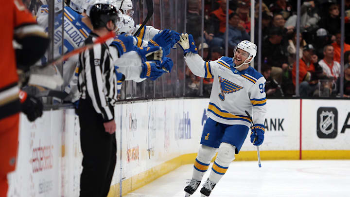 Mar 8, 2026; Anaheim, California, USA;  St. Louis Blues left wing Jonathan Drouin (92) celebrates with teammates after scoring a goal during the second period against the Anaheim Ducks at Honda Center. Mandatory Credit: Kiyoshi Mio-Imagn Images