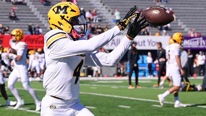Oct 12, 2024; Amherst, Massachusetts, USA; Missouri Tigers wide receiver James Madison II (4) warms up before a game against the Massachusetts Minutemen at Warren McGuirk Alumni Stadium. Mandatory Credit: Eric Canha-Imagn Images Oct 12, 2024; Amherst, Massachusetts, USA; Missouri Tigers wide receiver James Madison II (4) warms up before a game against the Massachusetts Minutemen at Warren McGuirk Alumni Stadium. Mandatory Credit: Eric Canha-Imagn Images