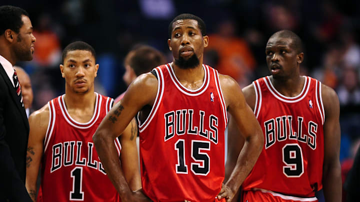 Chicago Bulls guard (1) Derrick Rose , guard (15) John Salmons and forward (9) Luol Deng against the Phoenix Suns at the US Airways Center. Chicago defeated Phoenix 115-104. Mandatory Credit: Mark J. Rebilas-Imagn Images